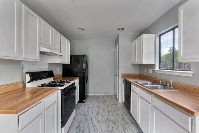 1806 Krizan Ave, Austin, TX 78727 - kitchen with gas range, dishwasher, under cabinet range hood, and white cabinets