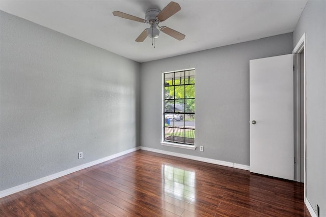 1806 Krizan Ave, Austin, TX 78727 - spare room featuring a ceiling fan, wood finished floors, and baseboards