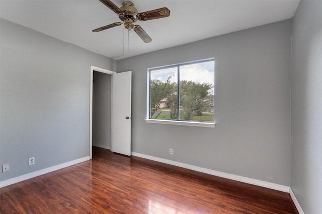 1806 Krizan Ave, Austin, TX 78727 - spare room featuring a ceiling fan, wood finished floors, and baseboards
