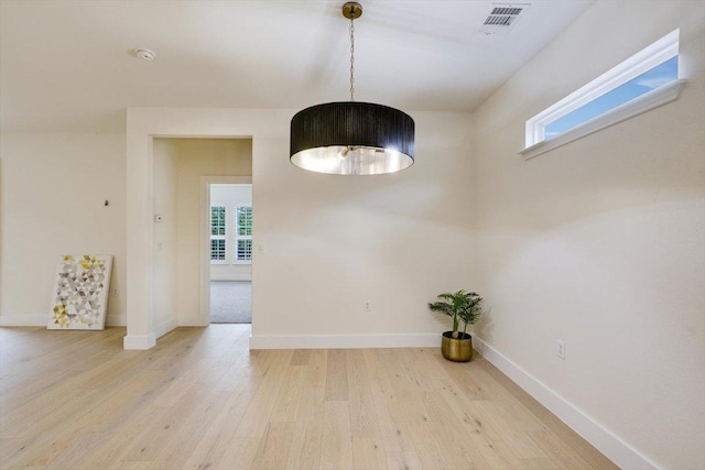 515 Mill Pond Path, Georgetown, TX 78633 - empty room featuring light wood-type flooring, baseboards, and a smoke detector