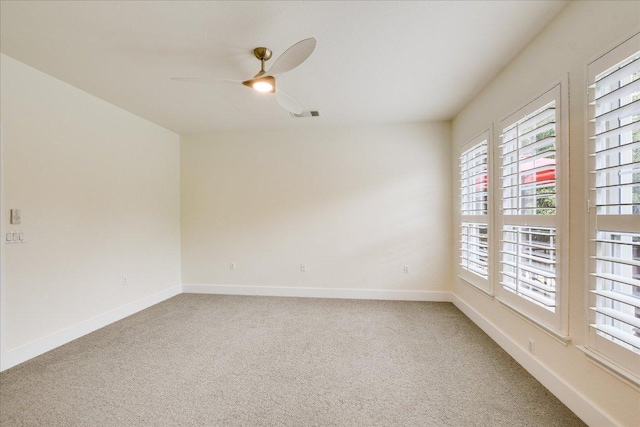 515 Mill Pond Path, Georgetown, TX 78633 - spare room featuring a ceiling fan, light colored carpet, and baseboards