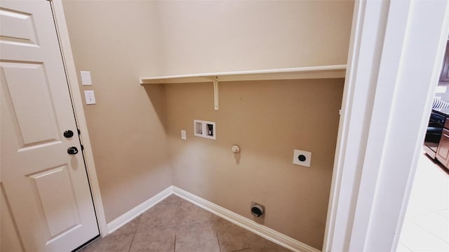 19516 Bridie Path, Pflugerville, TX 78660 - washroom featuring hookup for a gas dryer, electric dryer hookup, light tile patterned flooring, baseboards, and hookup for a washing machine