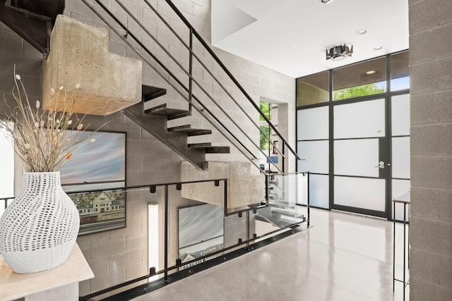 1003 E 8th St, Austin, TX 78702 - stairway featuring concrete block wall