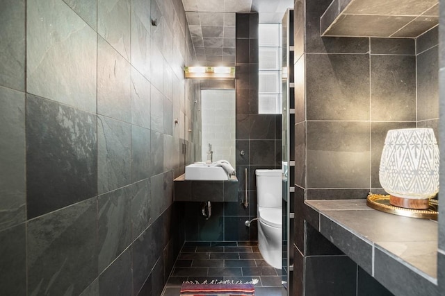 1003 E 8th St, Austin, TX 78702 - half bathroom featuring tile walls and tile patterned floors