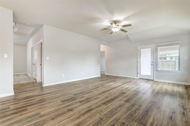 2824 Smokehouse Trl, Round Rock, TX 78665 - spare room with a ceiling fan, attic access, and wood finished floors