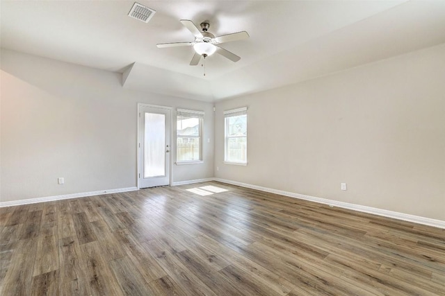 2824 Smokehouse Trl, Round Rock, TX 78665 - empty room with a ceiling fan and wood finished floors