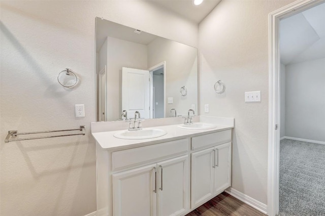 2824 Smokehouse Trl, Round Rock, TX 78665 - bathroom with double vanity and baseboards