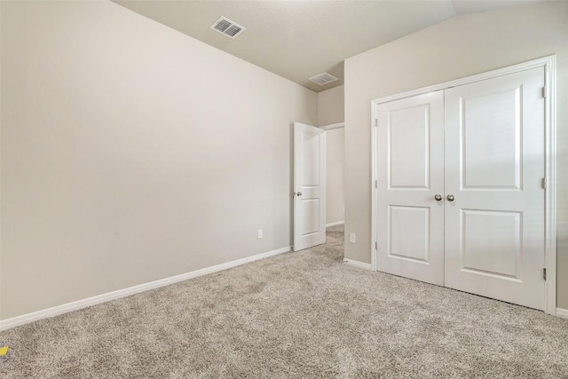 2824 Smokehouse Trl, Round Rock, TX 78665 - unfurnished bedroom with light colored carpet, baseboards, and a closet