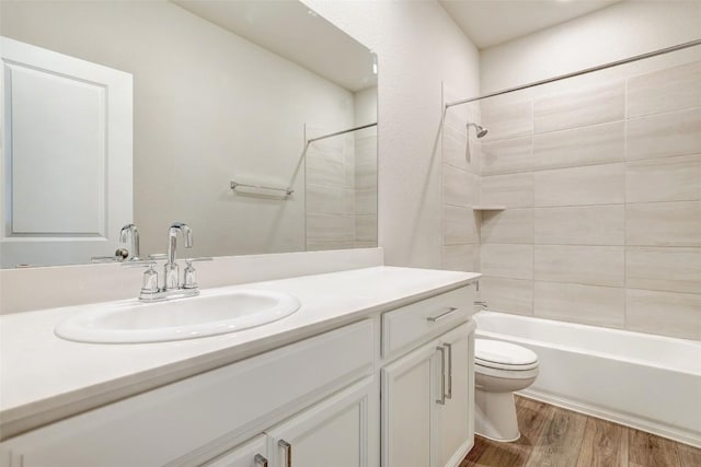 2824 Smokehouse Trl, Round Rock, TX 78665 - full bath featuring vanity, wood finished floors, and tub / shower combination