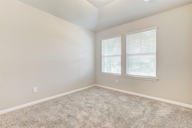 2824 Smokehouse Trl, Round Rock, TX 78665 - empty room featuring carpet flooring and lofted ceiling