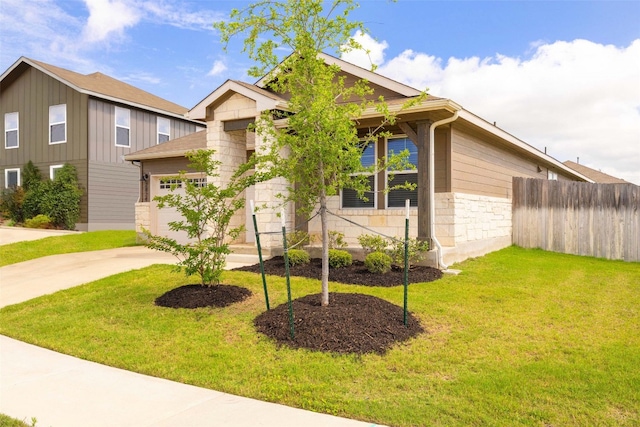 2824 Smokehouse Trl, Round Rock, TX 78665 - view of front of house with stone siding, a garage, and concrete driveway