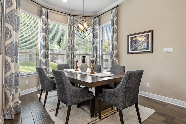 20012 Moorlynch Ave, Pflugerville, TX 78660 - dining space with a chandelier, dark wood-type flooring, and crown molding