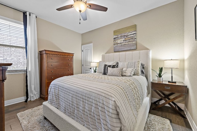 20012 Moorlynch Ave, Pflugerville, TX 78660 - bedroom with wood finished floors and a ceiling fan