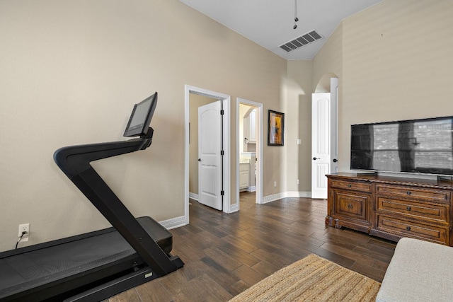 20012 Moorlynch Ave, Pflugerville, TX 78660 - exercise area featuring arched walkways, high vaulted ceiling, and dark wood-type flooring