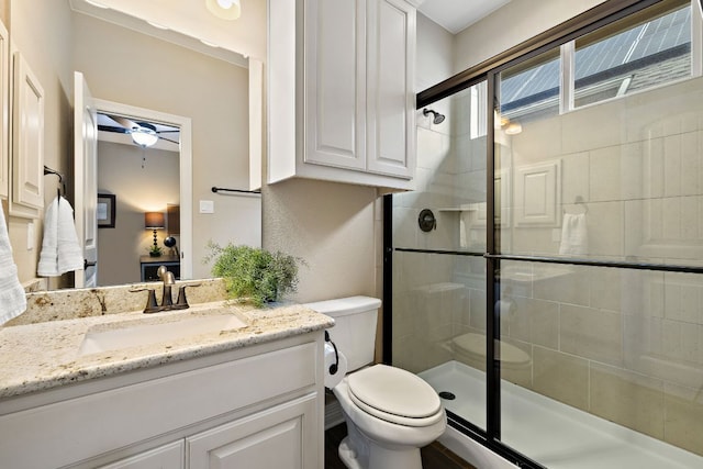 20012 Moorlynch Ave, Pflugerville, TX 78660 - bathroom with a shower stall, vanity, ensuite bathroom, and ceiling fan