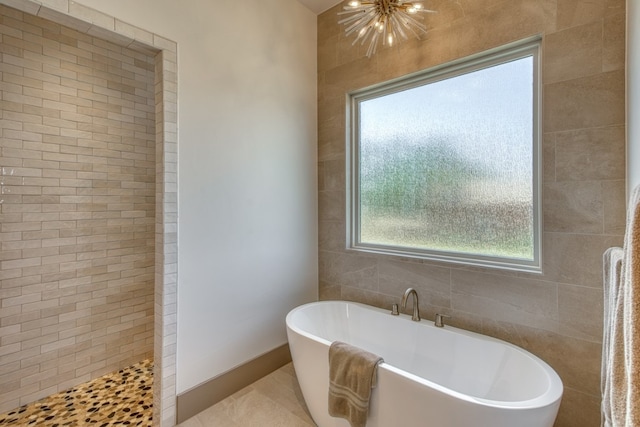 208 E Lakeshore Dr, Sunrise Beach, TX 78643 - bathroom with a freestanding bath and a walk in shower