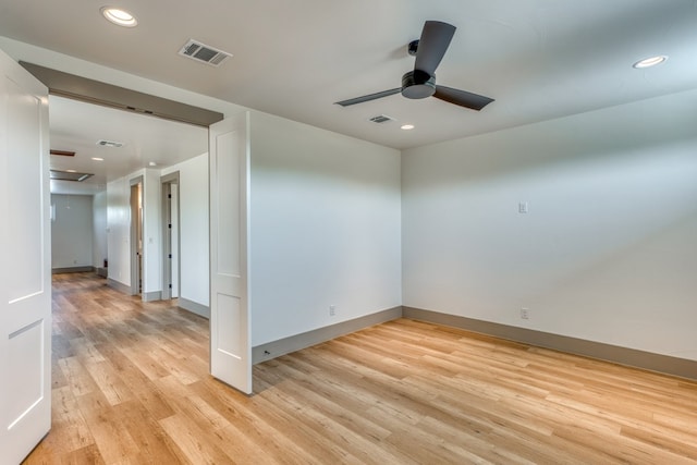 208 E Lakeshore Dr, Sunrise Beach, TX 78643 - empty room featuring a ceiling fan, light wood-style floors, recessed lighting, and baseboards