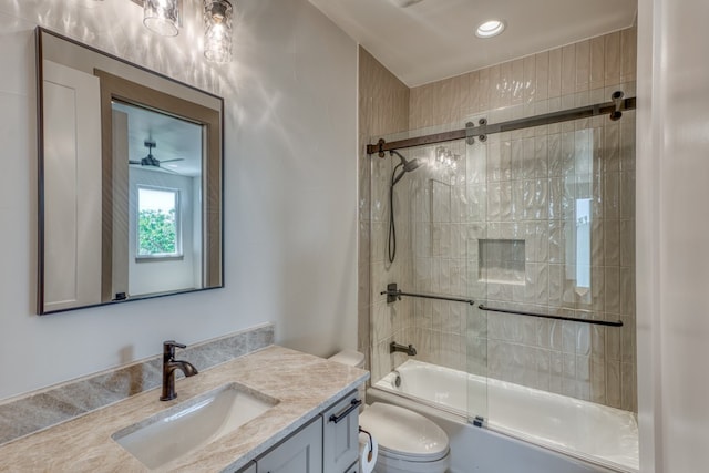 208 E Lakeshore Dr, Sunrise Beach, TX 78643 - bathroom featuring vanity, toilet, shower / bath combination with glass door, and recessed lighting