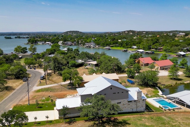 208 E Lakeshore Dr, Sunrise Beach, TX 78643 - bird's eye view of a large body of water and a pool area