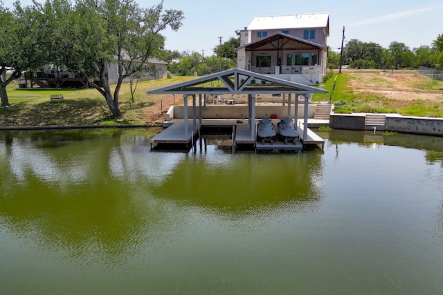 208 E Lakeshore Dr, Sunrise Beach, TX 78643 - dock area featuring a water view and boat lift