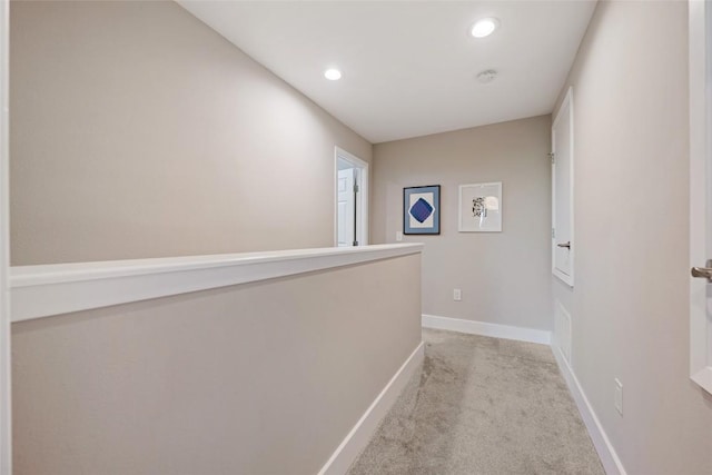 935 La Posada Dr Unit 243, Austin, TX 78752 - hallway featuring light carpet and recessed lighting