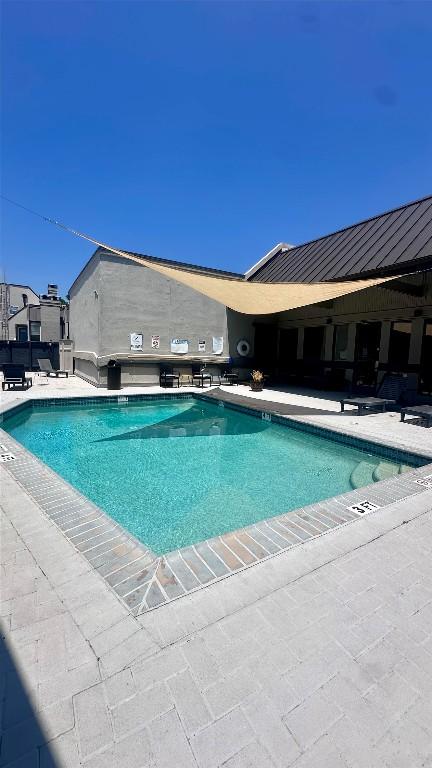 935 La Posada Dr Unit 243, Austin, TX 78752 - community pool with a patio