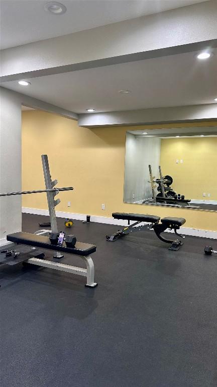 935 La Posada Dr Unit 243, Austin, TX 78752 - exercise area featuring recessed lighting and baseboards