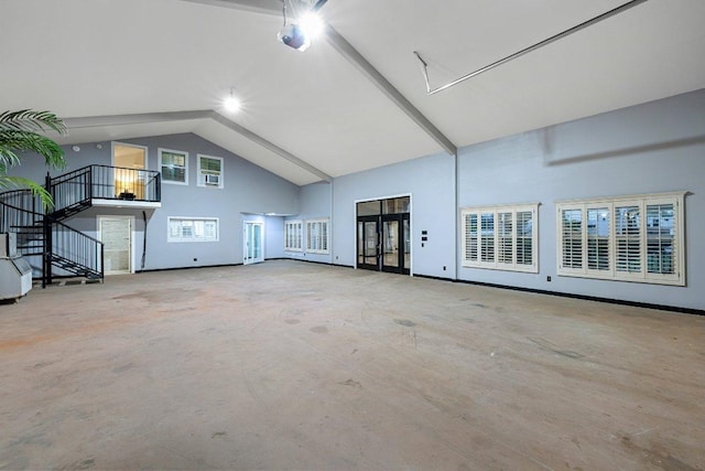 129 Cedar Dr, Horseshoe Bay, TX 78657 - back of property featuring stucco siding, stairs, and a patio area