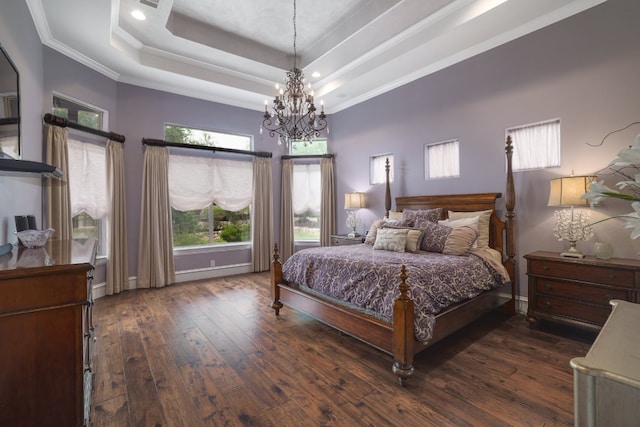 700 Zen Gardens Ter, Austin, TX 78732 - bedroom featuring a chandelier, dark wood-style flooring, ornamental molding, recessed lighting, and a raised ceiling