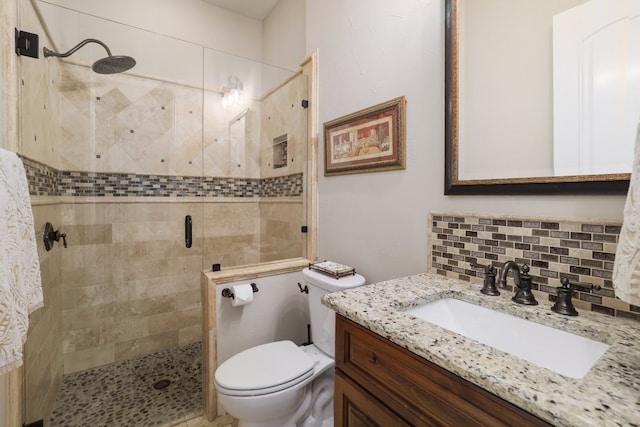700 Zen Gardens Ter, Austin, TX 78732 - bathroom featuring a stall shower, vanity, and decorative backsplash