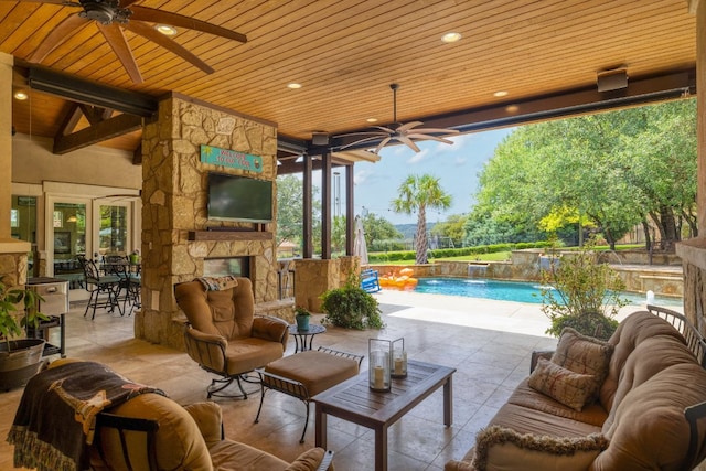 700 Zen Gardens Ter, Austin, TX 78732 - view of patio / terrace featuring a ceiling fan, an outdoor living space with a fireplace, and an outdoor pool