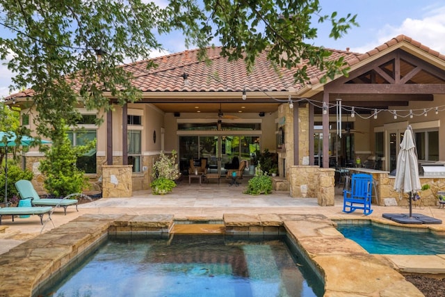 700 Zen Gardens Ter, Austin, TX 78732 - swimming pool with a ceiling fan and a patio area