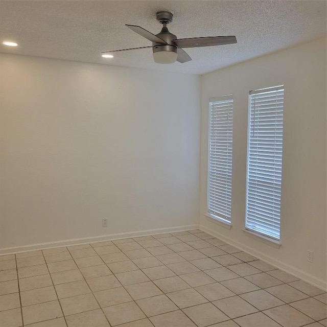 405 S Blue Ridge Parkway, Cedar Park, TX 78613 - unfurnished room with a textured ceiling, a ceiling fan, recessed lighting, and baseboards