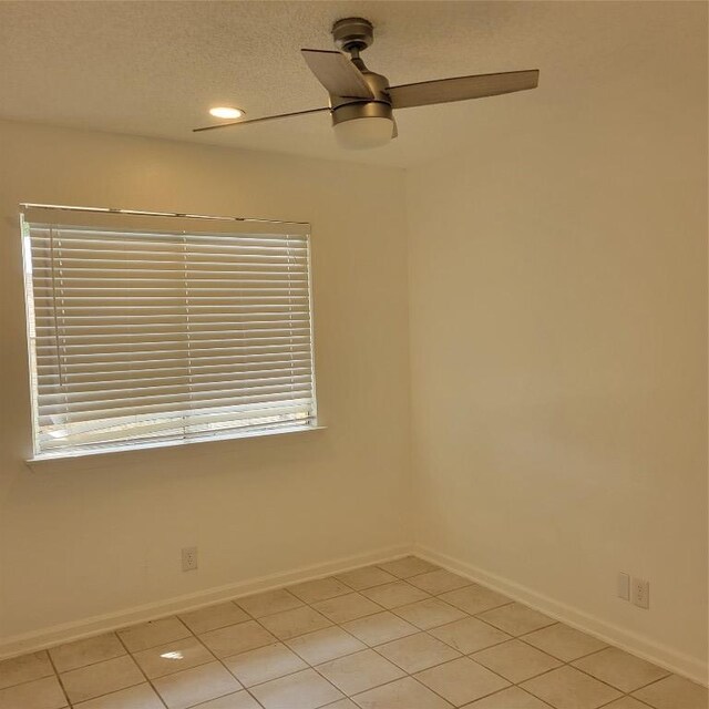 405 S Blue Ridge Parkway, Cedar Park, TX 78613 - spare room with a ceiling fan, light tile patterned floors, recessed lighting, and baseboards
