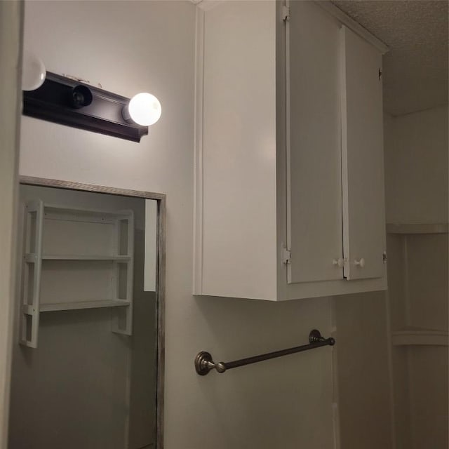 405 S Blue Ridge Parkway, Cedar Park, TX 78613 - bathroom with a textured ceiling