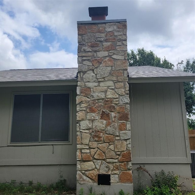 405 S Blue Ridge Parkway, Cedar Park, TX 78613 - exterior view of a chimney, a shingled roof, and stone siding