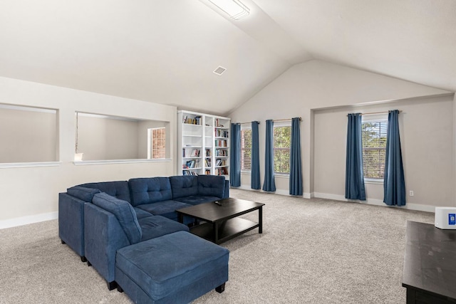 755 Hometown Pkwy, Kyle, TX 78640 - carpeted living room featuring vaulted ceiling and baseboards