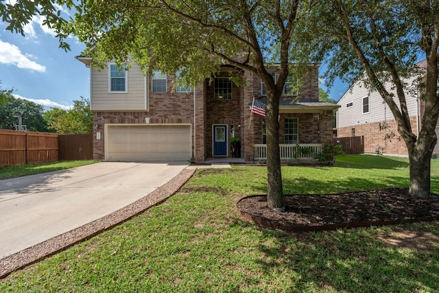 755 Hometown Pkwy, Kyle, TX 78640 - traditional-style house featuring a garage, concrete driveway, and brick siding