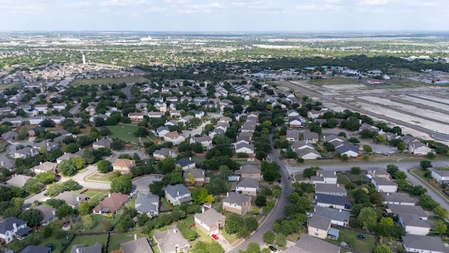 755 Hometown Pkwy, Kyle, TX 78640 - aerial view of property and surrounding area with nearby suburban area