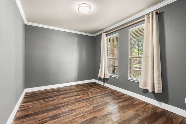 755 Hometown Pkwy, Kyle, TX 78640 - empty room with ornamental molding, dark wood-style flooring, and baseboards