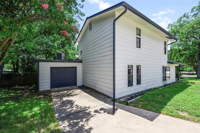 2814 Windsor Rd, Austin, TX 78703 - view of side of home with driveway and an attached garage