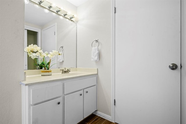 2814 Windsor Rd, Austin, TX 78703 - bathroom featuring double vanity and wood finished floors