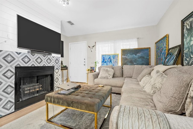 2814 Windsor Rd, Austin, TX 78703 - living room featuring wood finished floors and a large fireplace