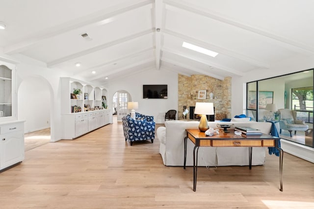 618 Hi Stirrup, Horseshoe Bay, TX 78657 - living room with arched walkways, light wood-type flooring, and recessed lighting