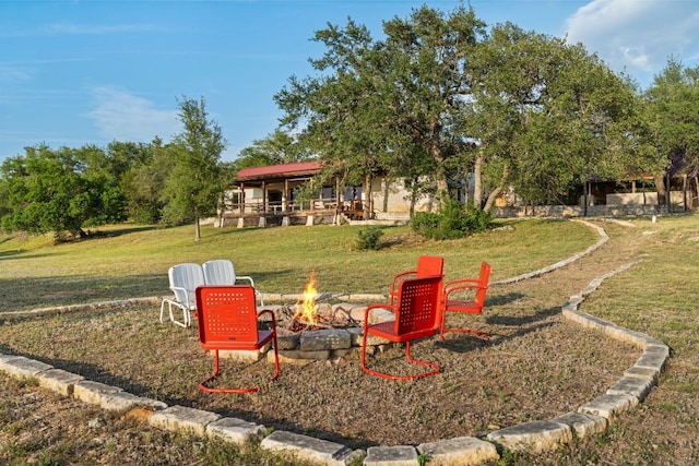492 Billy Sisson Rd, Johnson City, TX 78636 - view of green lawn featuring a fire pit