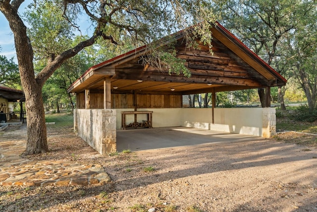 492 Billy Sisson Rd, Johnson City, TX 78636 - view of parking featuring a carport and driveway