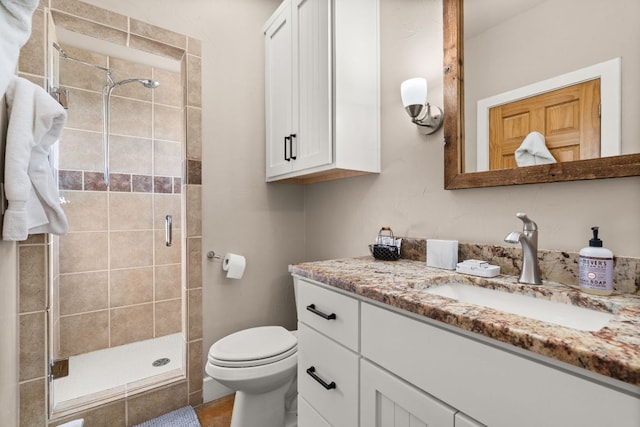 492 Billy Sisson Rd, Johnson City, TX 78636 - bathroom with vanity, toilet, and a shower stall