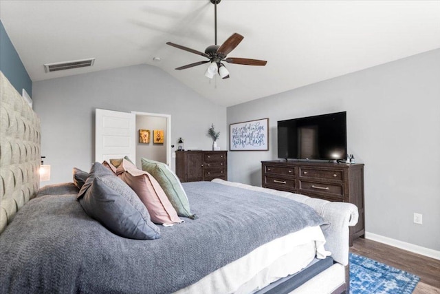 2313 Jake Pickle Pass, Leander, TX 78641 - bedroom featuring vaulted ceiling, wood finished floors, and ceiling fan
