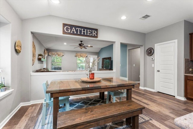 2313 Jake Pickle Pass, Leander, TX 78641 - dining space with wood finished floors, a ceiling fan, vaulted ceiling, and recessed lighting