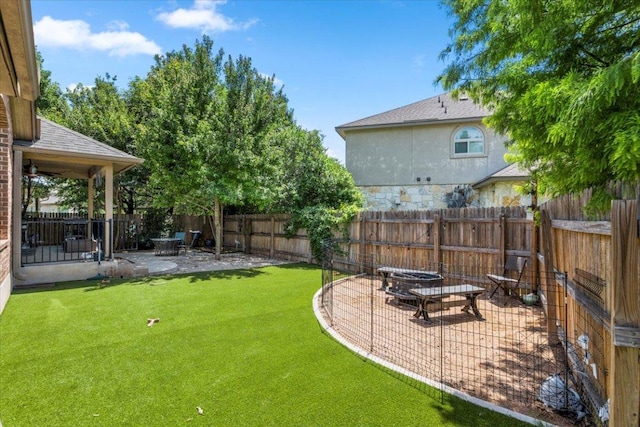 2313 Jake Pickle Pass, Leander, TX 78641 - fenced backyard with a patio